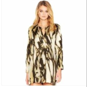 Rachel Roy’s Long-Sleeve cutout marble print.